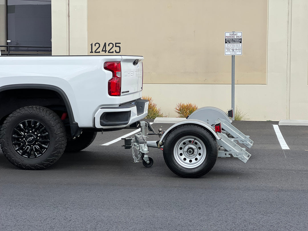 Side view of Car tow dolly folding ramps Car Tow Dolly inc
