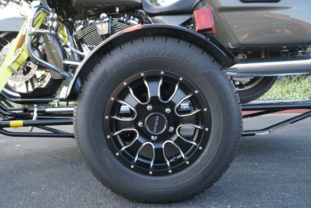 Raceline mamba wheel for three rail motorcycle trailer and single rail motorcycle trailer