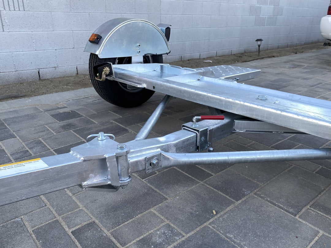 Swing away tounge action with swivel pan tilti down method tow dolly