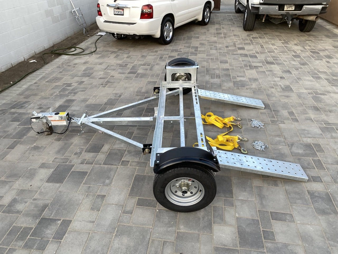 Side view of car tow dolly with disc brakes stand up car tow dolly brand new car hauler tow dolly