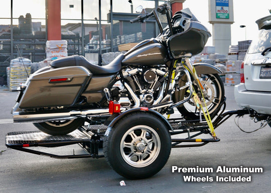 Ultra glide, honda goldwing, cruisers dirt bike and sport bike motorcycle trailer. Folds up for storage and stands out with the new wheels