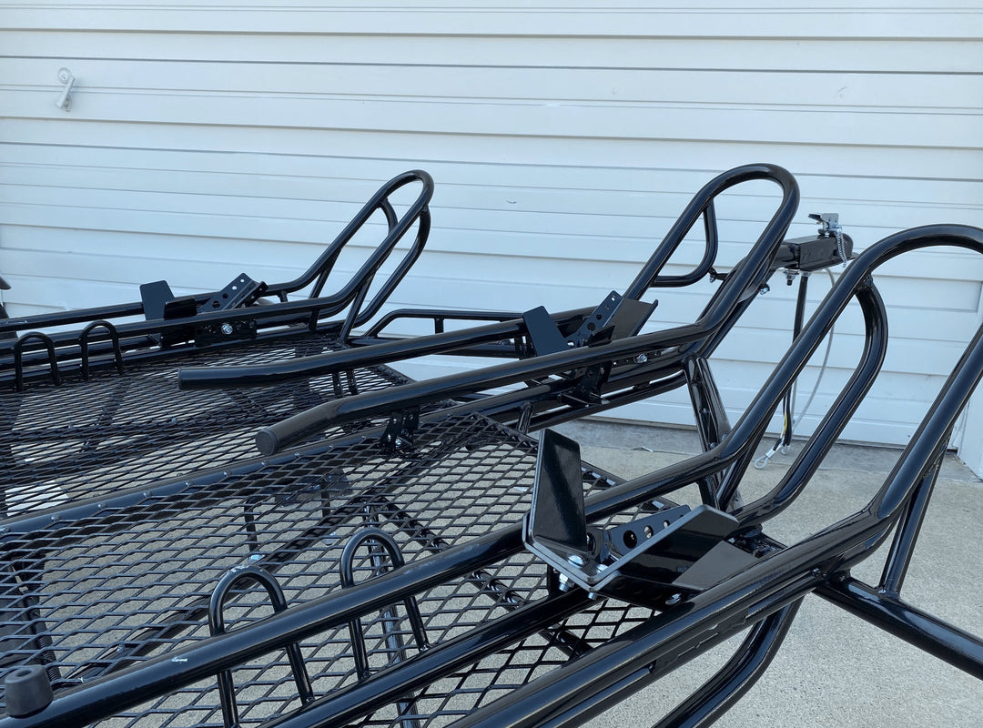 Motorcycle wheel chocks with three rails fully adjustable. Similar to stinger trailer and Zieman trailer