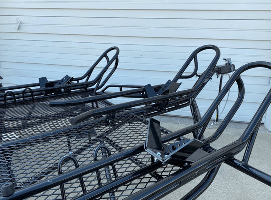 Motorcycle wheel chocks with three rails fully adjustable. Similar to stinger trailer and Zieman trailer