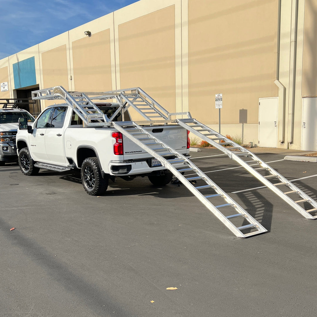 12-foot aluminum bi-fold UTV ramps set for high-deck trailer loading
