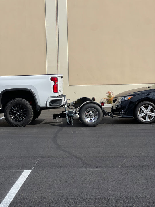 "Car tow dolly's frame and wheels, showcasing durability"