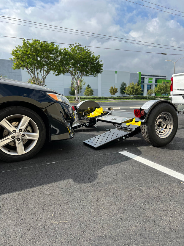 "Foldable car tow dolly with Demco surge brakes"