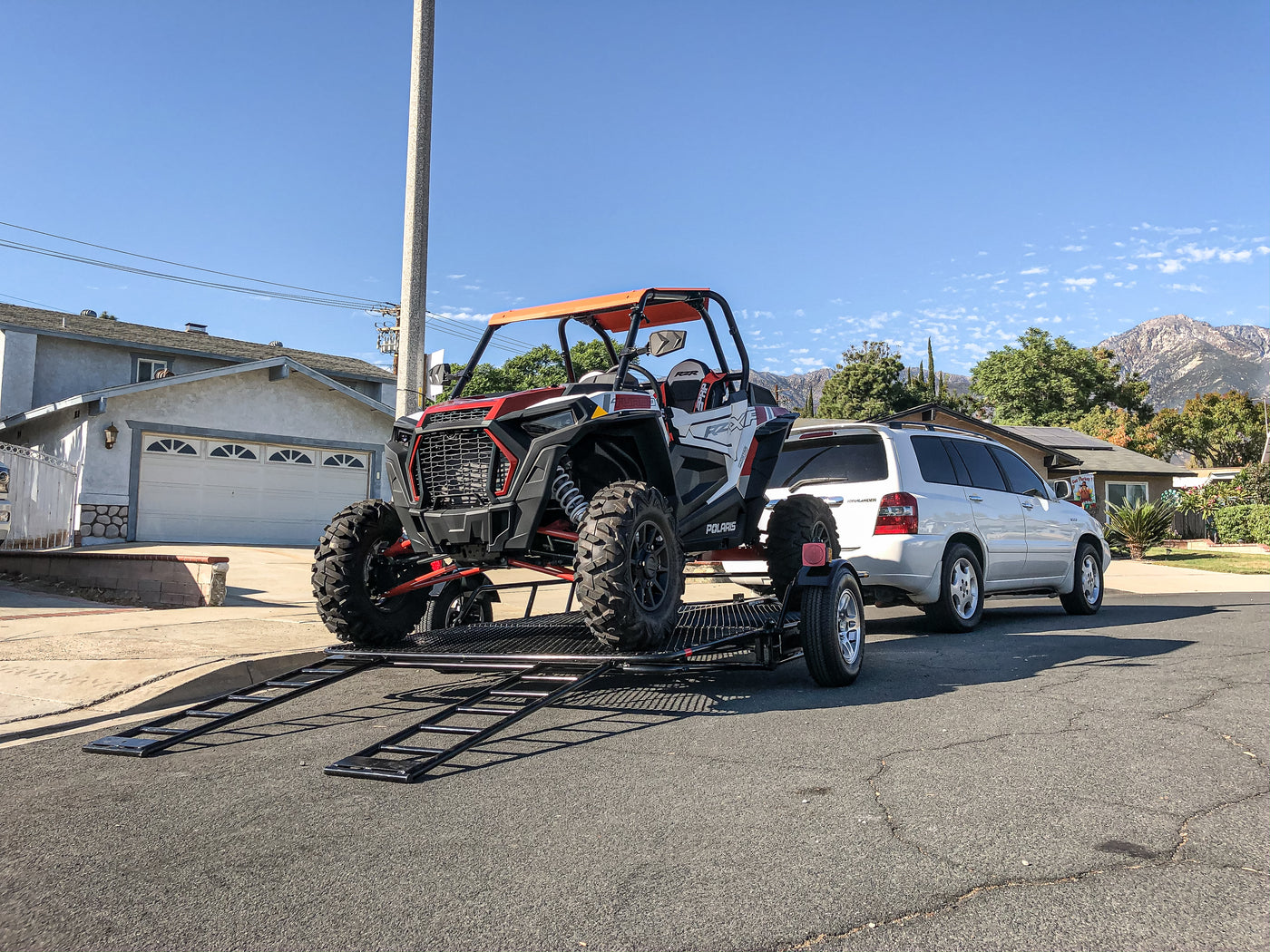 Utility Trailer with Razor Turbo xp Model being towed 