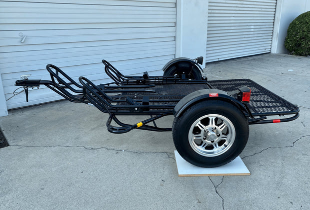 Stand up Motorcycle Trailer folds for storage easy to store. Light weight motorcycle trailer  