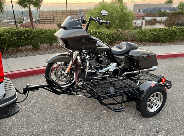 Road glide on motorcycle trailer similar to single rail motorcycle trailer