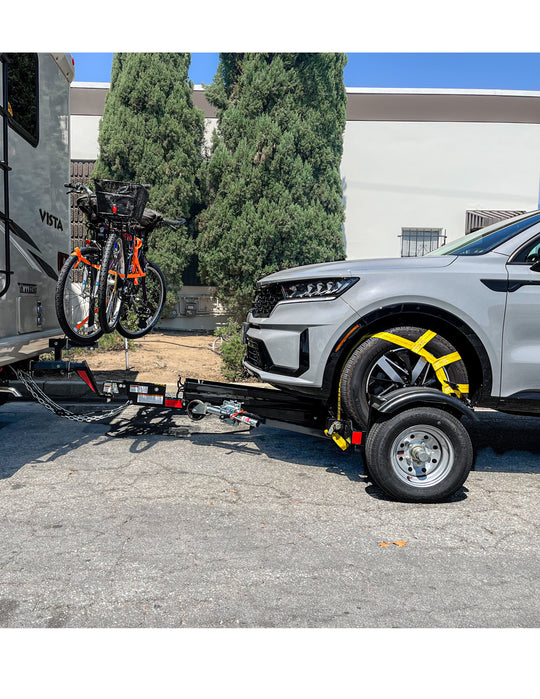Stand up tow dolly side view with straps and bike rack 