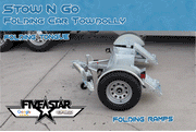 STOW N GO FOLDING CAR TOW DOLLY - UNIQUE ONE AND ONLY FOLDING TOW DOLLY WHICH RAMPS CAN COME APART AT ANY TIME TO REDUCE STORAGE SPACE. 